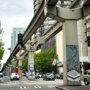 Multiple monorail column murals along 5th AVe